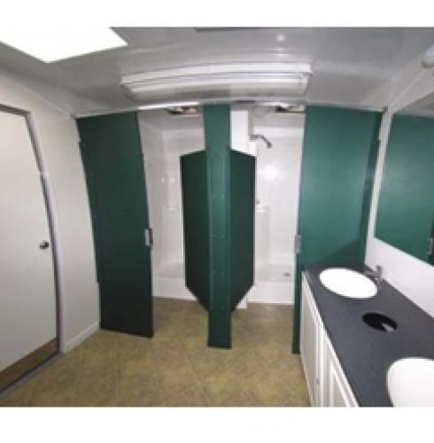 interior of 4 stall portable shower trailer 0